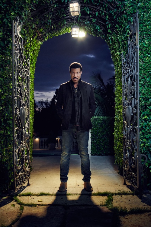Jacket by John Varvatos, T-shirt from Barneys New York, denim by AllSaints and boots by Givenchy